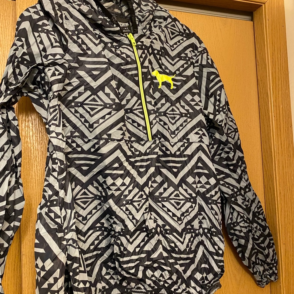 A pink rain coat for running